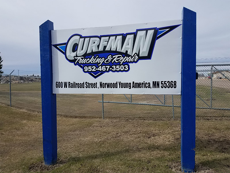 Curfman Trucking & Repair sign
